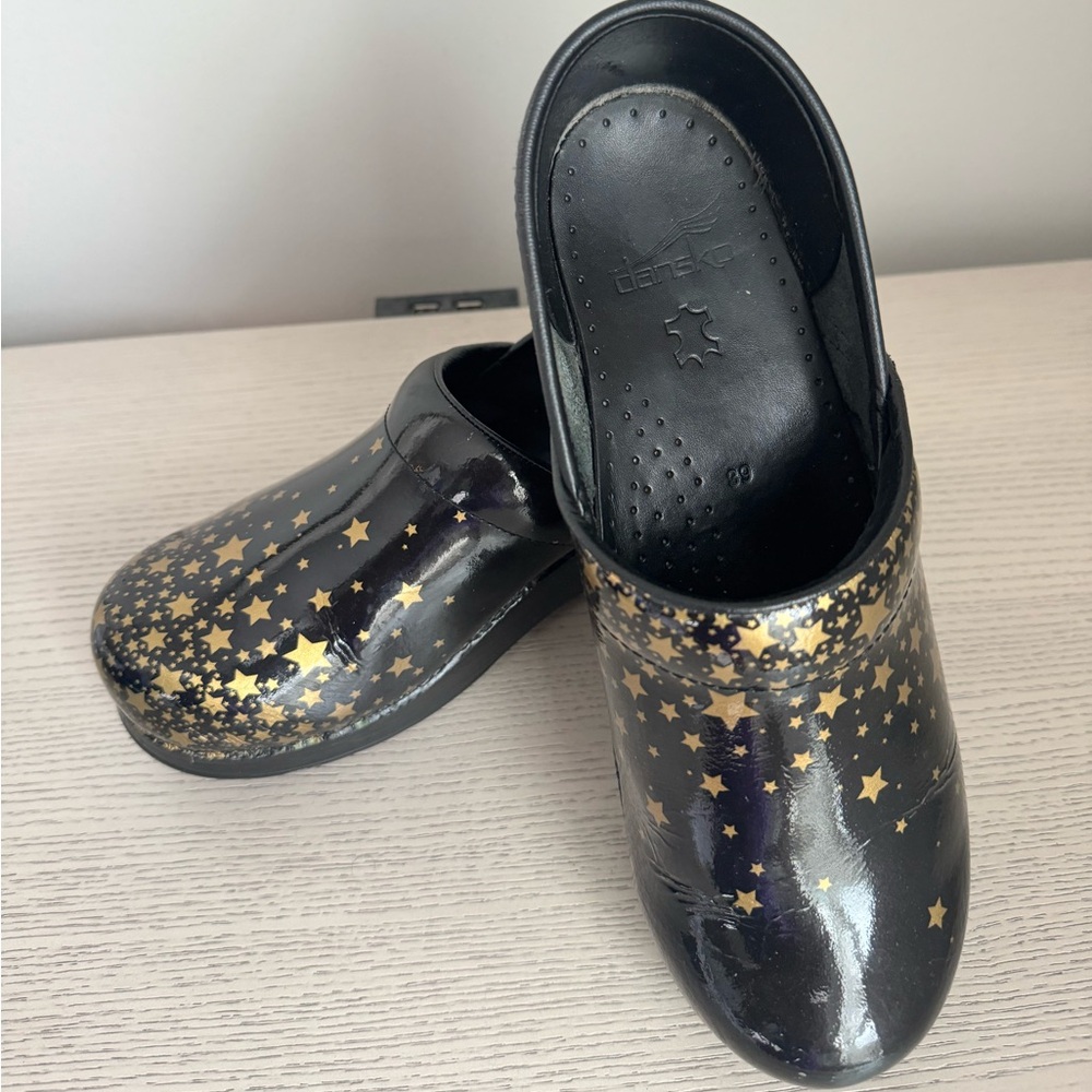 Women’s Dansko. Black and Gold. Size 39 EU/ 8.5-9 US. Gently worn.